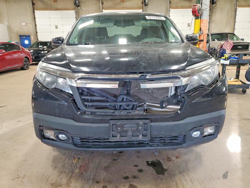 Photo 5 from auction – 2017 HONDA RIDGELINE RTL AWD with VIN 5FPYK3F5XHB037529