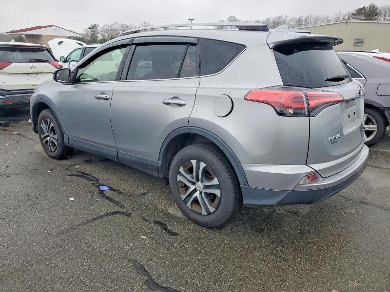 Photo 2 from auction – 2018 TOYOTA RAV4 LE with VIN JTMBFREV8JJ236147