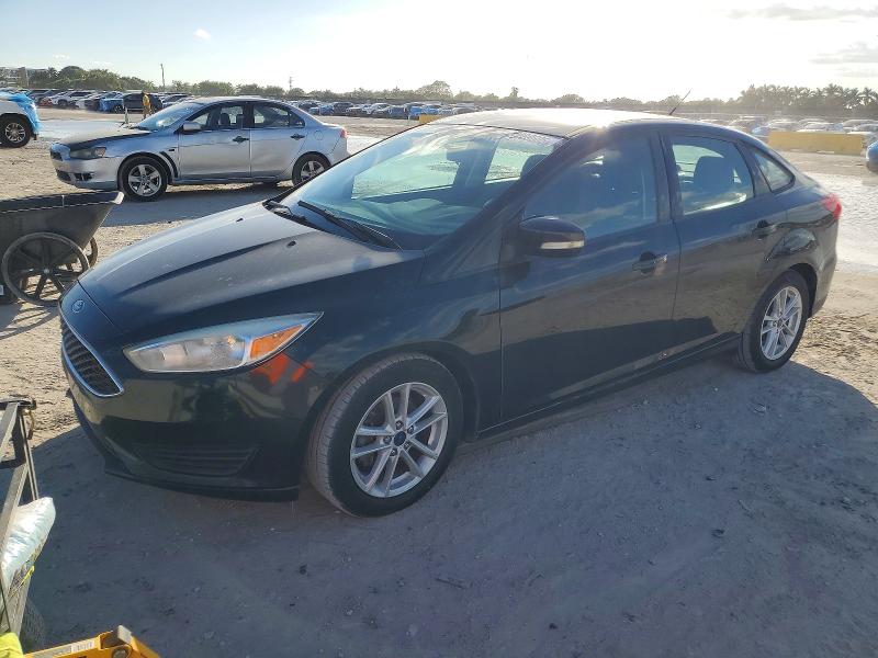 FORD FOCUS SE 2015 with VIN 1FADP3F2XFL371980 - Photo from auction