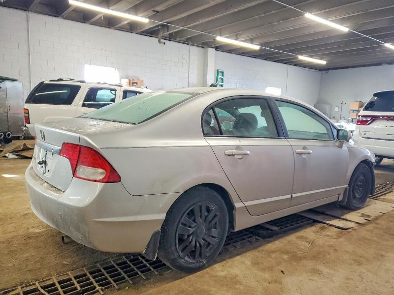 Photo 3 from auction – 2010 HONDA CIVIC LX with VIN 19XFA1F53AE063389
