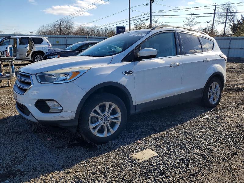 FORD ESCAPE SE 2018 with VIN 1FMCU9GD5JUB15522 - Photo from auction