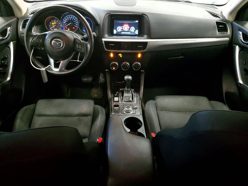Photo 8 from auction – 2016 MAZDA CX-5 with VIN JM3KE2CY3G0881995