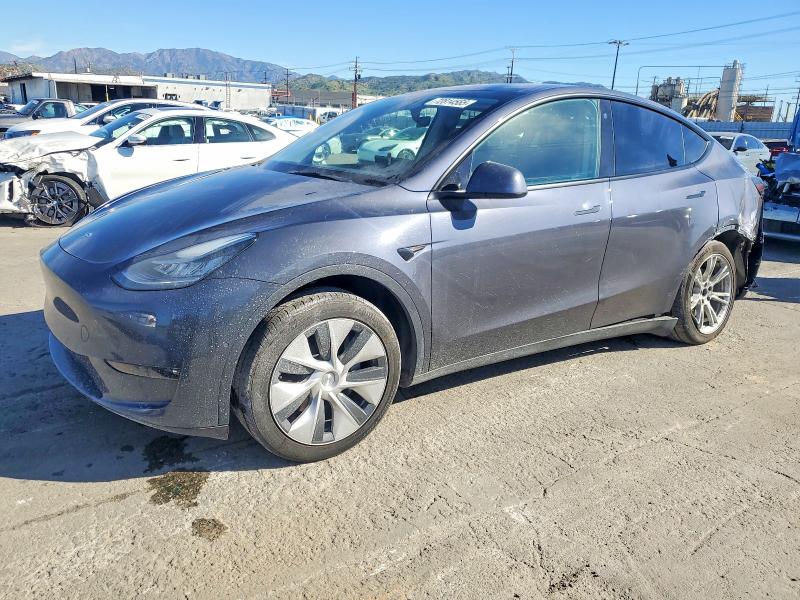 TESLA MODEL Y 2022 with VIN 7SAYGAEE6NF576535 - Photo from auction
