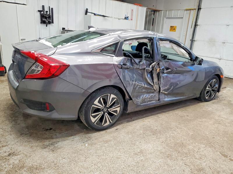 Photo 3 from auction – 2018 HONDA CIVIC EX with VIN JHMFC1F31JX036649