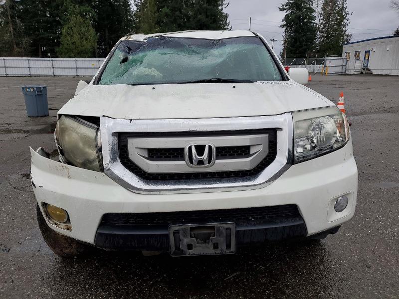 Photo 5 from auction – 2011 HONDA PILOT TOUR with VIN 5FNYF4H96BB084180