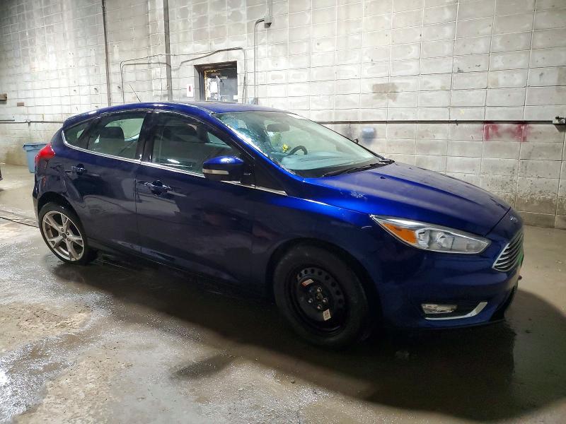 Photo 4 from auction – 2016 FORD FOCUS TITA with VIN 1FADP3N21GL369554
