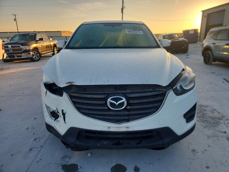 Photo 5 from auction – 2016 MAZDA CX-5 with VIN JM3KE2BY2G0887983