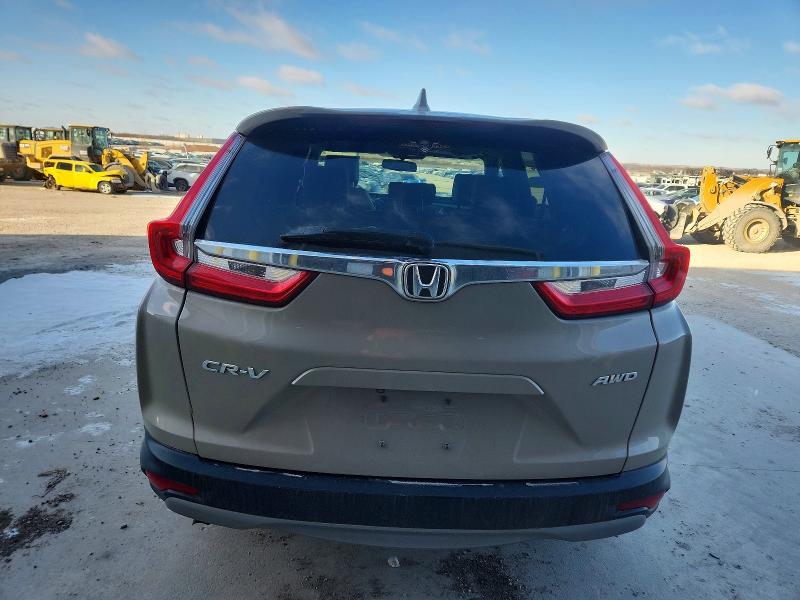 Photo 6 from auction – 2017 HONDA CR-V with VIN 5J6RW2H85HL037383