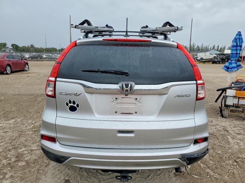 Photo 6 from auction – 2015 HONDA CR-V EXL with VIN 2HKRM4H79FH634813