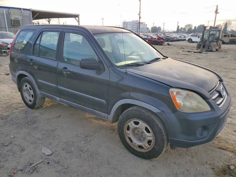 Photo 4 from auction – 2005 HONDA CR-V LX with VIN JHLRD68595C020142