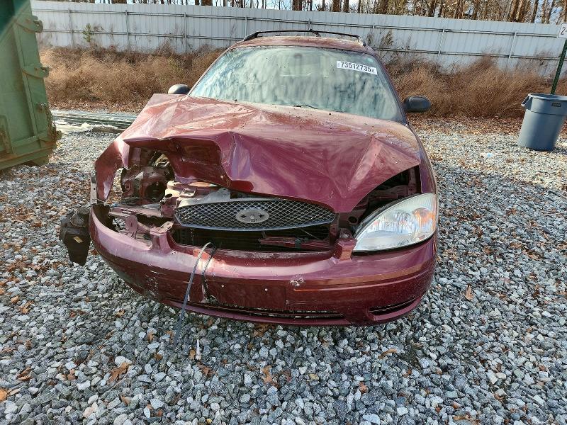 Photo 5 from auction – 2004 FORD TAURUS SE with VIN 1FAFP58234A205780