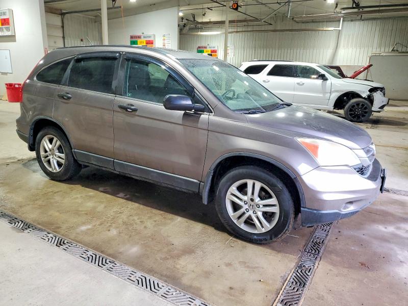 Photo 4 from auction – 2011 HONDA CR-V EX with VIN 5J6RE4H54BL024474
