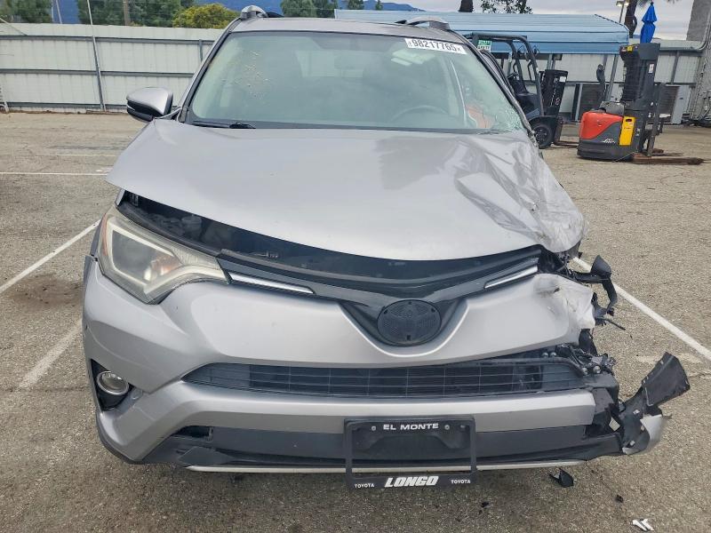 Photo 5 from auction – 2016 TOYOTA RAV4 with VIN 2T3WFREV6GW247479