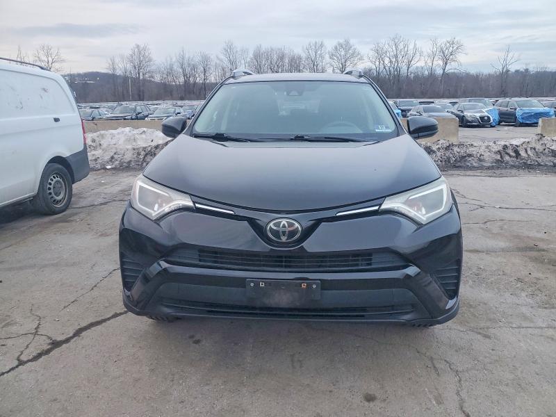 Photo 5 from auction – 2018 TOYOTA RAV4 LE with VIN 2T3BFREV2JW698883
