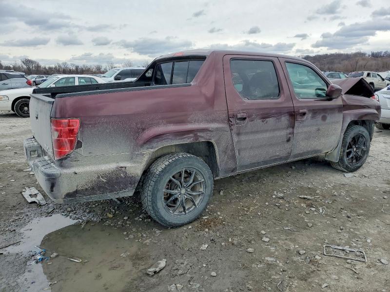 Photo 3 from auction – 2010 HONDA RIDGELINE with VIN 5FPYK1F58AB006645