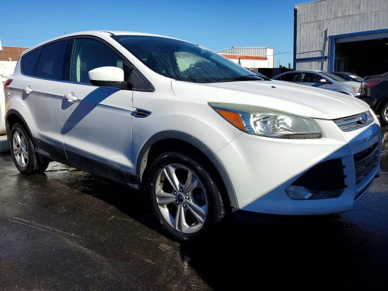Photo 4 from auction – 2016 FORD ESCAPE SE with VIN 1FMCU9GX4GUB74984