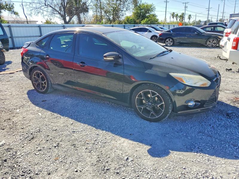 Photo 4 from auction – 2014 FORD FOCUS SE with VIN 1FADP3F2XEL204128