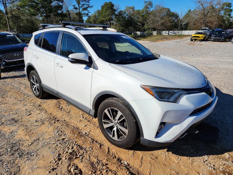 Photo 4 from auction – 2017 TOYOTA RAV4 XLE with VIN JTMRFREV9HD216397