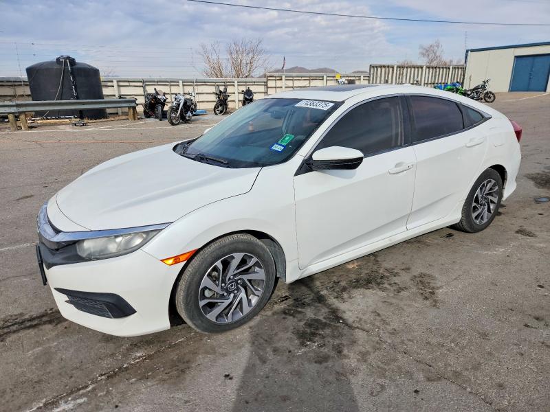 HONDA CIVIC 2018 with VIN 2HGFC2F74JH529581 - Photo from auction
