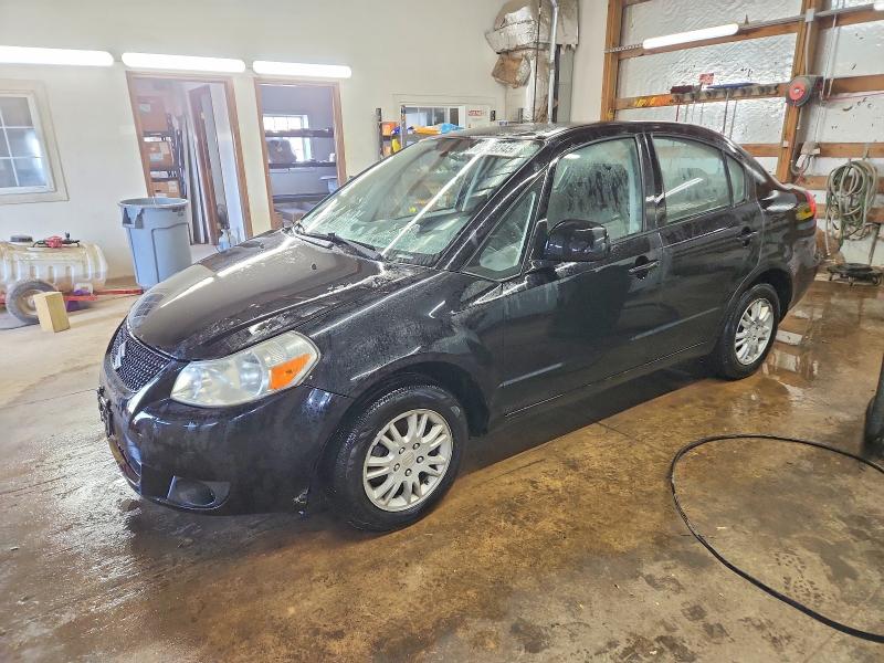 SUZUKI SX4 LE 2012 with VIN JS2YC5A39C6304080 - Photo from auction