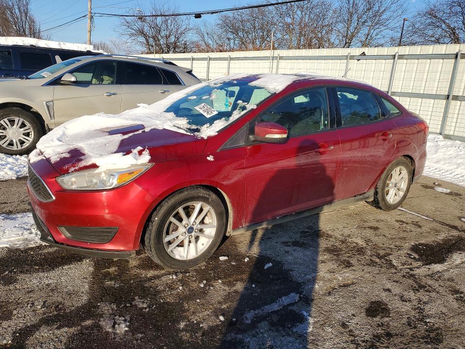 FORD FOCUS SE 2016 with VIN 1FADP3F21GL213786 - Photo from auction