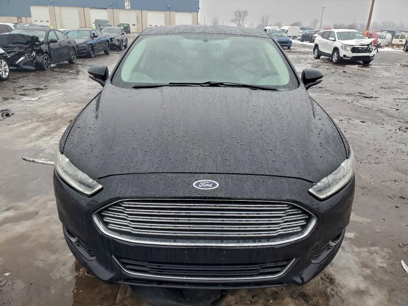 Photo 5 from auction – 2016 FORD FUSION TIT with VIN 3FA6P0K9XGR391580