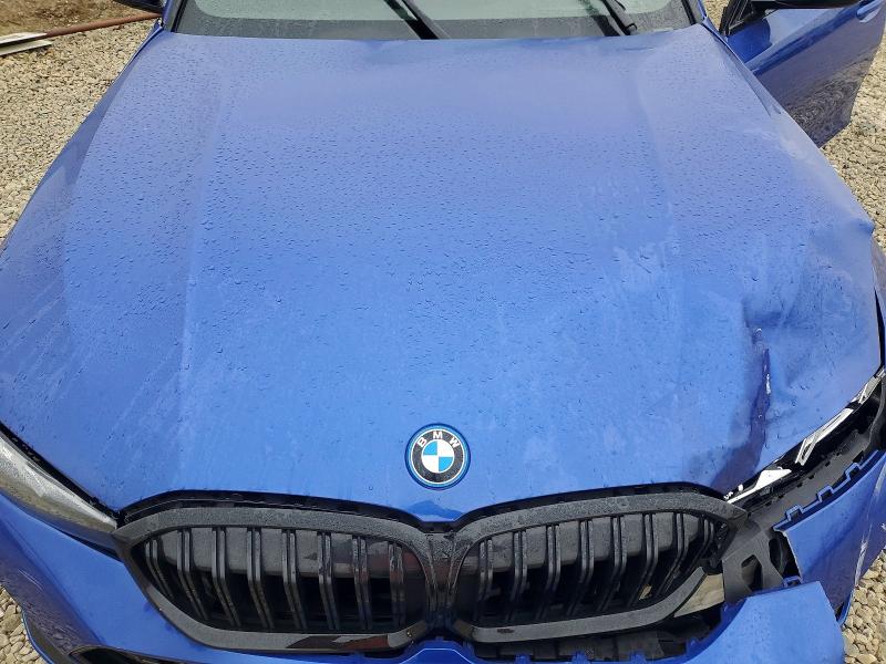 Photo 11 from auction – 2023 BMW 330E with VIN 3MW39FF06P8C94644