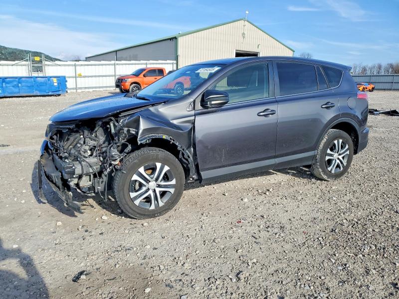 TOYOTA RAV4 LE 2018 with VIN JTMBFREV3JJ732571 - Photo from auction