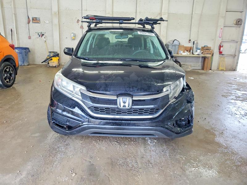 Photo 5 from auction – 2016 HONDA CR-V LX with VIN 2HKRM3H35GH502043
