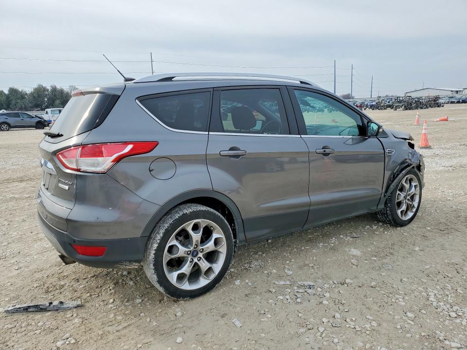 Photo 3 from auction – 2014 FORD ESCAPE with VIN 1FMCU0J98EUD31242