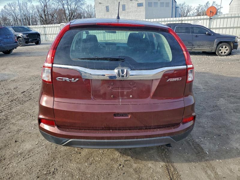 Photo 6 from auction – 2015 HONDA CR-V LX with VIN 2HKRM4H38FH701561