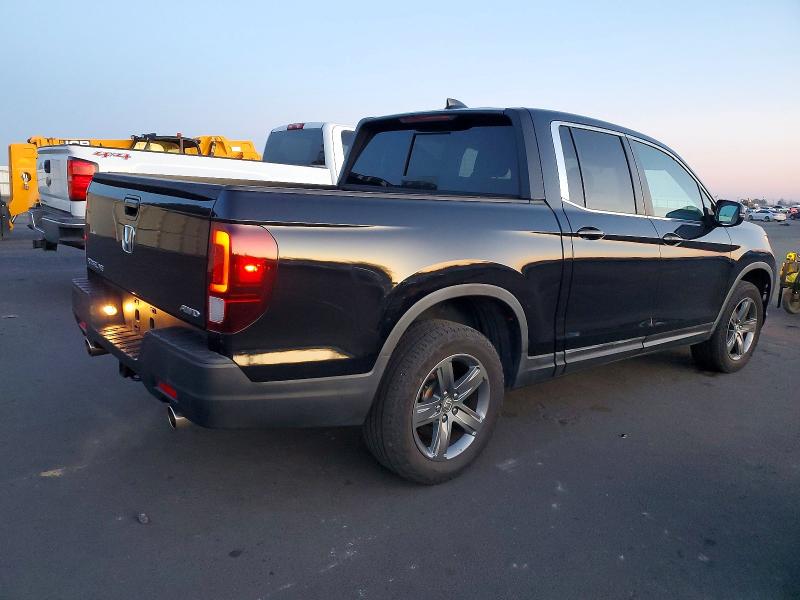 Photo 3 from auction – 2023 HONDA RIDGELINE with VIN 5FPYK3F54PB010213
