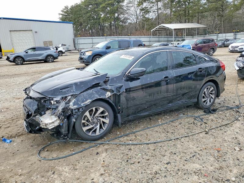 HONDA CIVIC 2017 with VIN 19XFC2F74HE037587 - Photo from auction