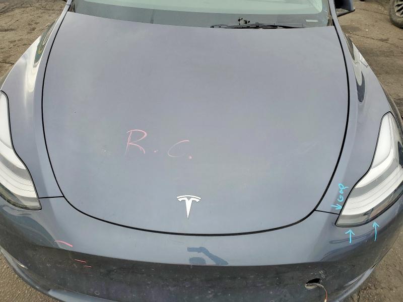 Photo 11 from auction – 2022 TESLA MODEL Y with VIN 7SAYGDEE8NA021021