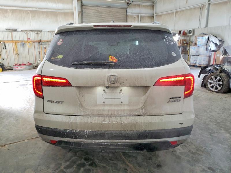 Photo 6 from auction – 2016 HONDA PILOT TOUR with VIN 5FNYF6H91GB031907