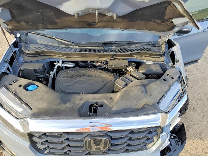 Photo 12 from auction – 2022 HONDA PASSPORT E with VIN 5FNYF7H53NB005292