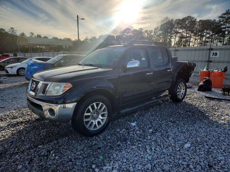 NISSAN FRONTIER 2010 with VIN 1N6AD0ER3AC411955 - Photo from auction