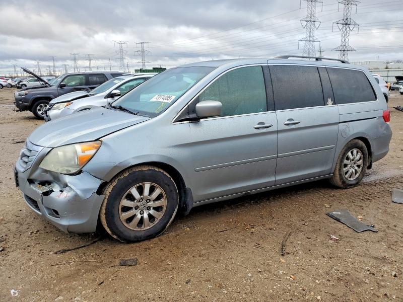 HONDA ODYSSEY EX 2010 with VIN 5FNRL3H77AB028561 - Photo from auction