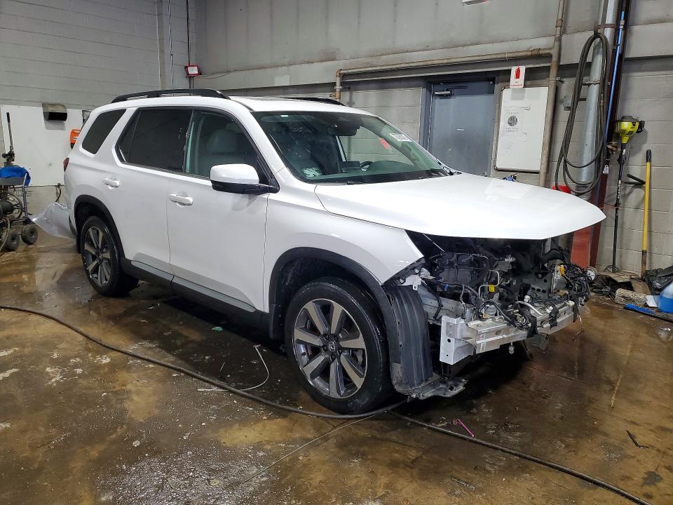 Photo 4 from auction – 2023 HONDA PILOT TOUR with VIN 5FNYG1H73PB053003