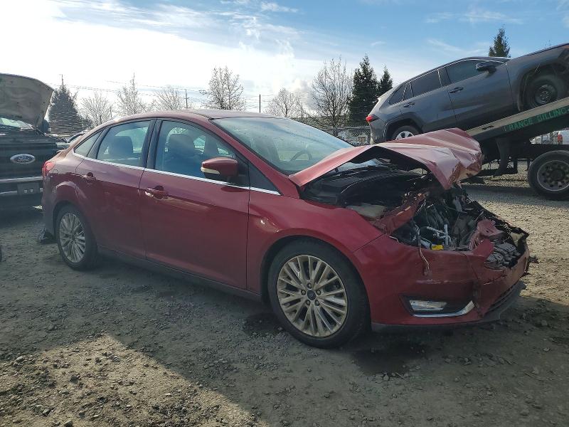 Photo 4 from auction – 2016 FORD FOCUS with VIN 1FADP3J27GL337519
