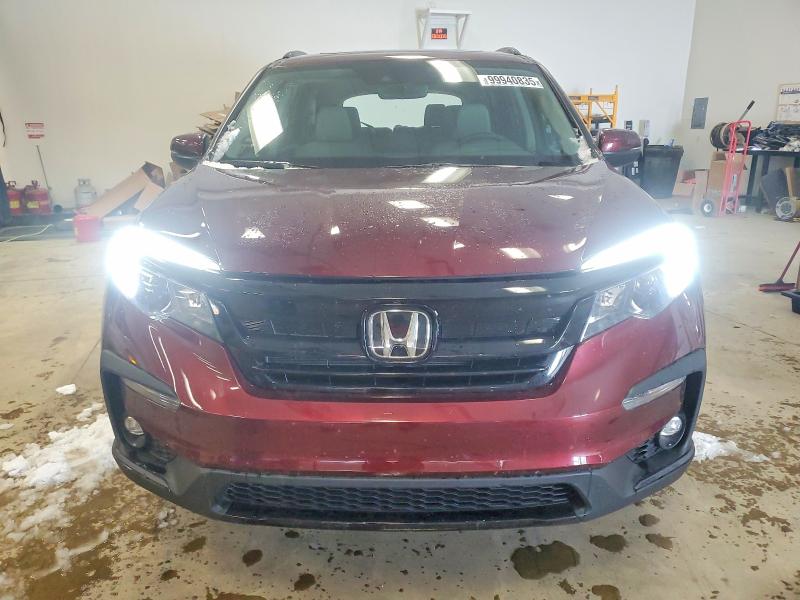 Photo 5 from auction – 2022 HONDA PILOT SE with VIN 5FNYF6H2XNB052254