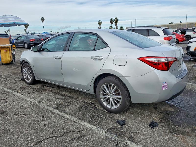Photo 2 from auction – 2014 TOYOTA COROLLA L with VIN 5YFBURHE0EP121352