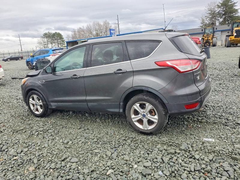 Photo 2 from auction – 2015 FORD ESCAPE with VIN 1FMCU0GX1FUB68523