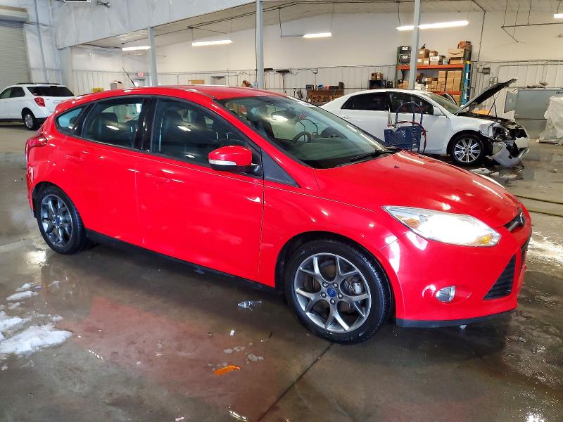 Foto 4 de la subasta – 2014 FORD FOCUS SE con VIN 1FADP3K29EL415066