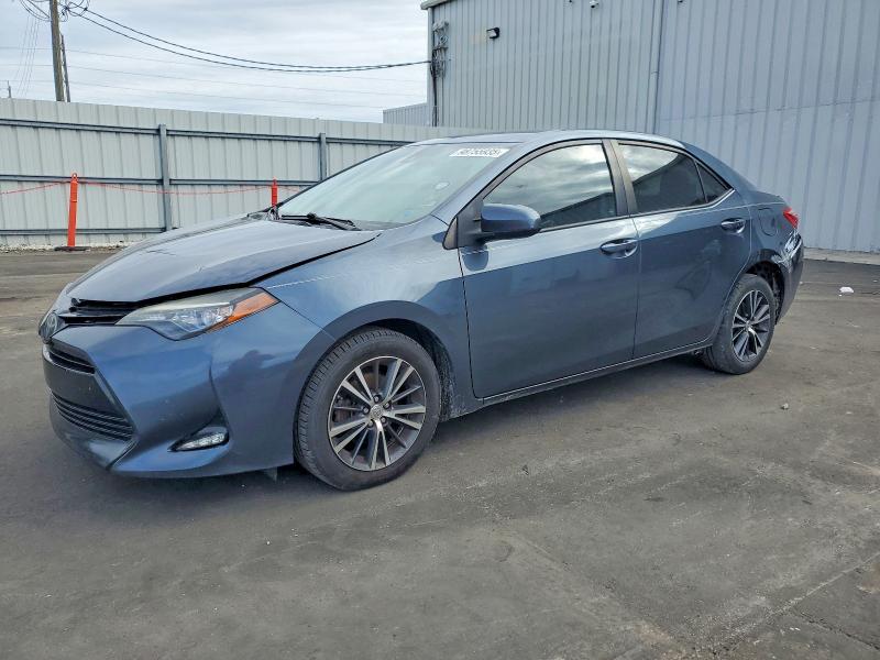 TOYOTA COROLLA L 2017 with VIN 2T1BURHE4HC815093 - Photo from auction