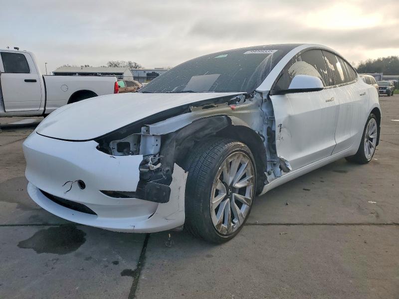 TESLA MODEL 3 2022 with VIN 5YJ3E1EB0NF143960 - Photo from auction