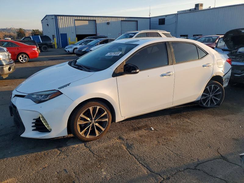 TOYOTA COROLLA 2017 with VIN 5YFBURHE7HP577188 - Photo from auction