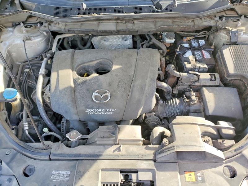Photo 11 from auction – 2014 MAZDA CX-5 GT with VIN JM3KE2DY0E0335084