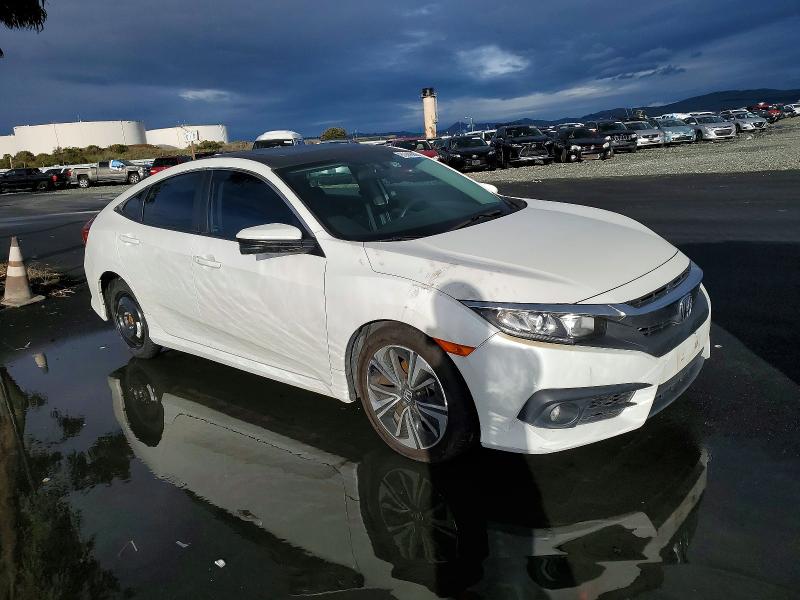 Photo 4 from auction – 2017 HONDA CIVIC with VIN 19XFC1F33HE205663