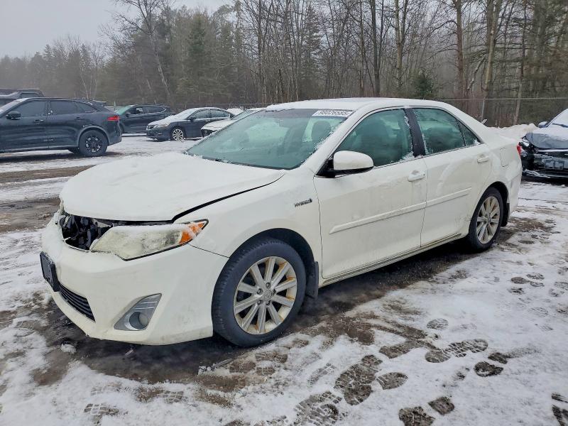 TOYOTA CAMRY HYBR 2012 with VIN 4T1BD1FKXCU059254 - Photo from auction